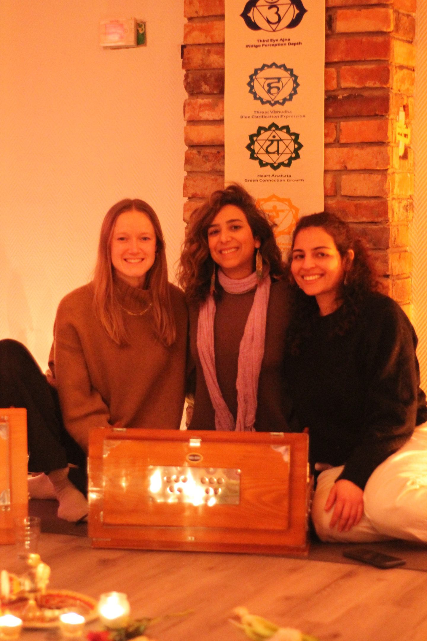 Ritika, Shohre and a guest at a Parea gathering in Berlin